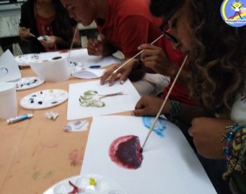 Joel Ramos en el Dia Munidal Pintor Boca y Pie